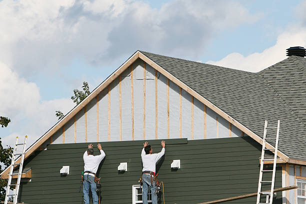 Professional Siding technician working in Hershey, PA